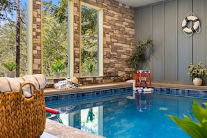 This cabin offers a private, heated pool, fun for all ages with games included.