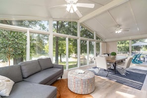 Experience dining with a view in our glass-walled sun room overlooking the shimmering lake.