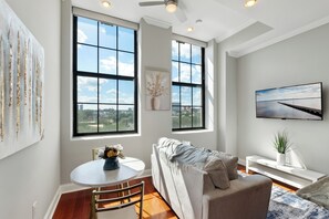 Modern furnished living room and a lovely dinner to compliment.
