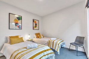 Cozy Single beds, complimentary linen and towels