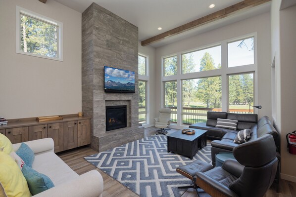 Curl up in the main-floor living room & stream your favorites with a view!