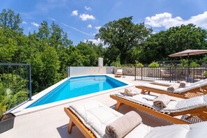 Large sun deck area with heated, 8 x 4 private swimming pool 