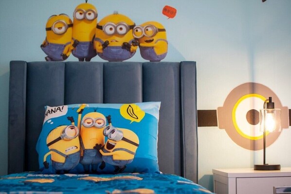 Fun-filled Minion-themed bedroom for kids to enjoy a playful stay.