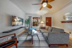 Living room with plenty of comfortable seating and smart TV