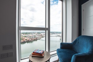  Relax in the master bedroom and watch boats sail by as you enjoy a good book.