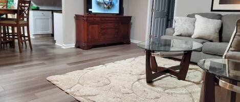 Cozy up on the sectional and watch the 55" TV.