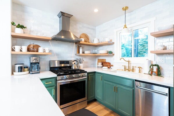 Updated kitchen with high end appliances, all of the amenities, & snacks.