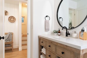 Main floor full bathroom. Stocked with shampoo/conditioner/body wash and more 