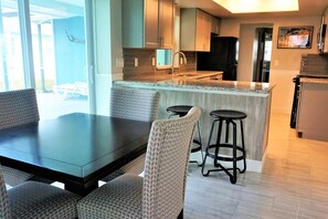 Eat in Kitchen area with view of the pool