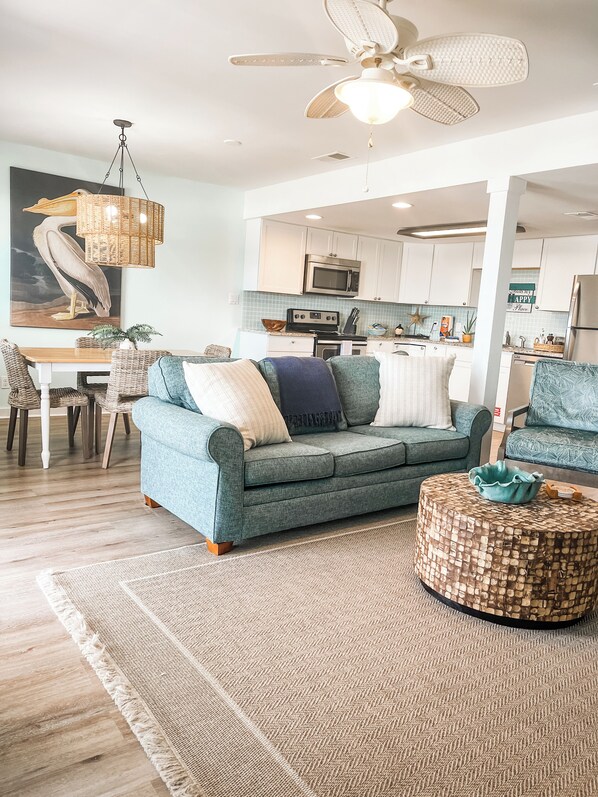 Open concept living room/dining room/kitchen all overlooking the water!
