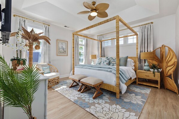 The master bedroom suite is a tropical oasis with a king size canopy bed