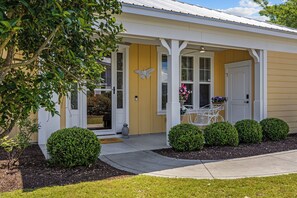 Welcoming front covered porch with private entrance