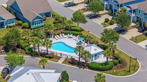 Community pool located steps away from the bunaglow