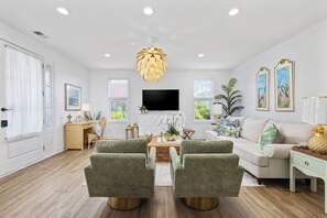 Open floor plan with ample seating and natural light