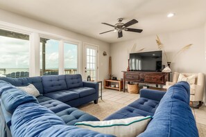 002 Dreamcatcher Living Room with Large TV and Beach View
