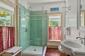 Minty fresh bathroom with a splash of vintage flair!