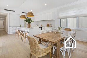 Indoor dining setting for 8 and breakfast bar for 4