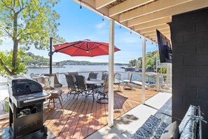 Plenty of Outdoor Space on the Deck with a Grill, Seating, Firepit, and Smart TV