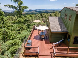 Perched high and perfectly nestled in the trees.  It doesn't get much better