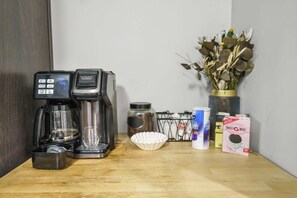 Kitchen: Your morning coffee ritual made easy with our fully equipped coffee station, complete with a FlexBrew coffee maker and all the essentials.