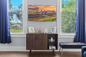 Living Room: Chic, comfortable, and filled with natural light — the perfect space to unwind or catch up on your favorite shows