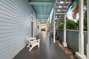 Main Entry on covered porch with seating
