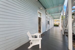 Main Entry on covered porch with seating