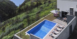 A View Of The Surrounding Tranquil Hills And Sea View From Vistaserena Villa In Madeira By Ourmadeira
