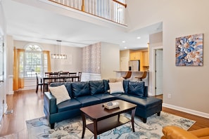 This spacious living room area has plenty of seating for all!