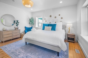 Main bedroom, King bed, 65" smart TV, hardwood, large en-suite, blackout shades