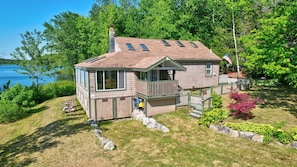 Front side of the property that shows the entrance and stairs