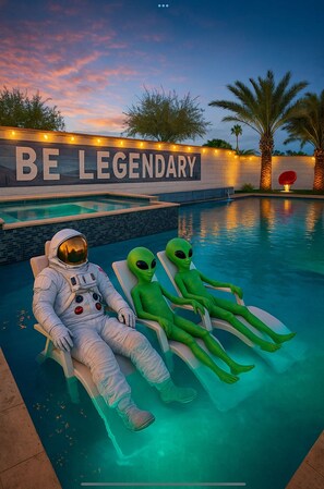 Everything in this photo is real minus the astronaut and aliens. Pool Deck with Spa that can seat up to 16