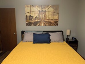This king size bed is awaiting your arrival.