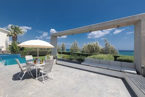Large Garden with shaded seating area and private pool