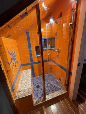 Tiled shower.