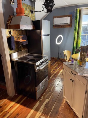 Oven with fume hood.