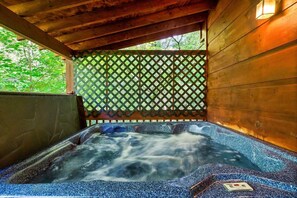 Escape the hustle and bustle as you soak in the warmth of this inviting hot tub tucked away in a covered space, shielded by a rustic wooden fence. 🛁🌲 #PrivateOasis #SereneRetreat #HomeSpa