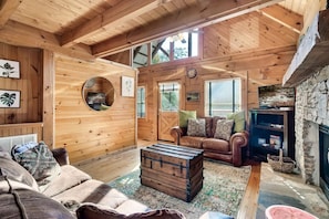 Transform your living room into a cozy sanctuary with plush furniture and a crackling fireplace. Embrace warmth and comfort at home