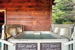 "Relax and unwind in your own personal sanctuary with our cabin hot tub – the ideal retreat from daily concerns."