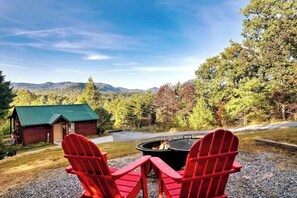 "Enjoy the spring with serene mountain vistas and verdant trees, a nature lover's dream come true. Grilling up a storm on my front yard, surrounded by endless beauty."
#cabinlife 
#mountainviews 
#grillmaster