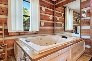 Relax and unwind in our rustic-style hot tub! Surrounded by the beauty of nature, our hot tub provides the perfect escape from the stresses of daily life. Soak your worries away and let the warm water ease your muscles. 