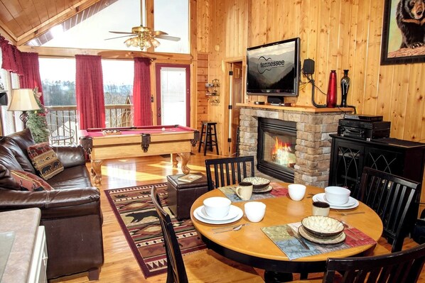 When it's chilly outside, you need a fireplace to enjoy your favorite Netflix shows while curled up on a warm leather couch. Your option, play a pool game or have some coffee. That says it all!