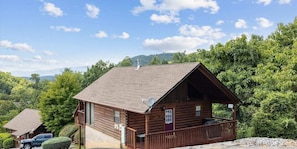"Experience the best of both worlds in this cabin nestled among the trees, where peaceful mountain living meets the excitement of Dollywood just a stone's throw away, providing the ultimate getaway for all."