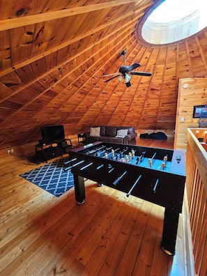 Transform any space into a fun zone with a foosball table and a ceiling fan!