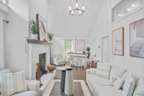 2nd Flr: Living Room with Bar, Deck Balcony with Seating Couche + Main Bed Room