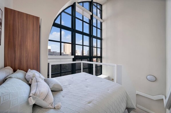 Bedroom with skyline views