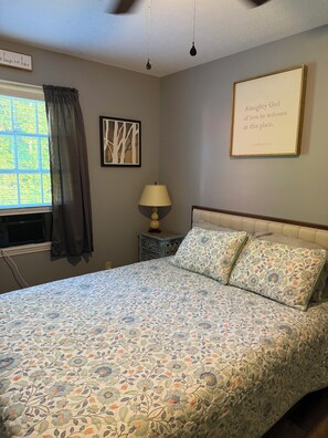 Cozy queen bed.