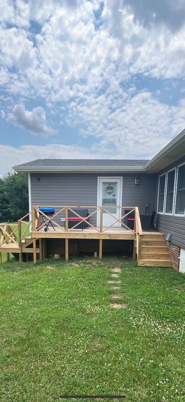Walk around house to separate entrance to MIL suite 