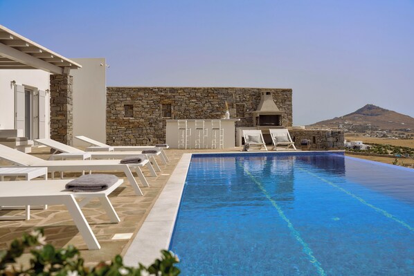 Sophisticated pool surroundings offering a sense of tranquility.