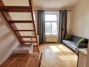 Living room and stairs to bed